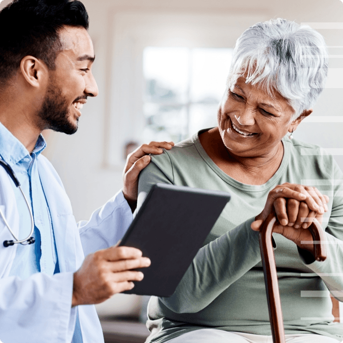 nephrologist laughing with his elderly patient