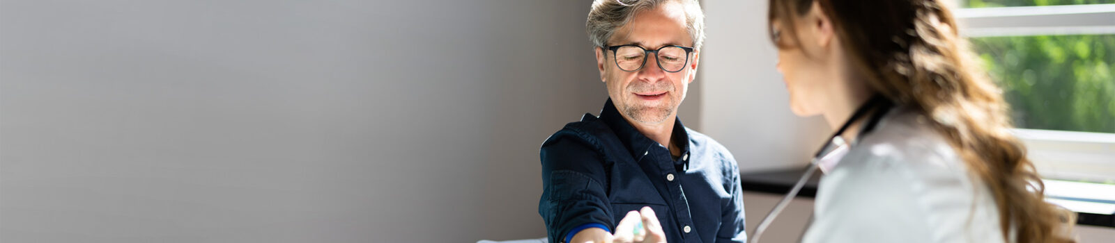 Doctor performing check up on patient